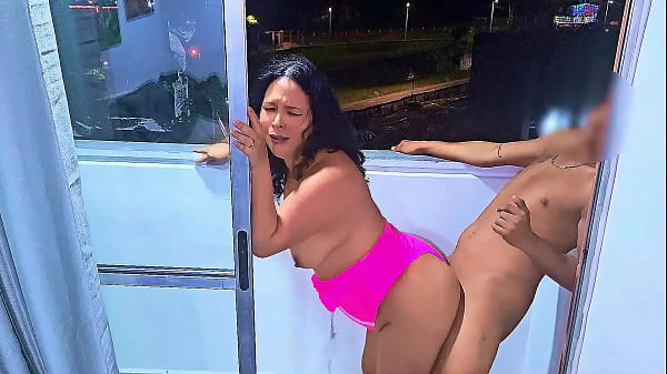 latina slut fucking and sucking cock on a balcony overlooking the public street in medellin a wet blowjob and a frenetic fuck while she is being fucked the cars pass by on the road venezuelan bitch