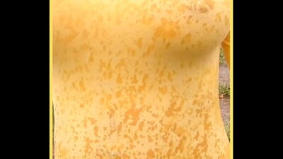 MILF wears see through shirt in the rain  perfect tits on show