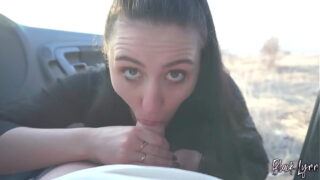 black lynn sucks cock in a car at sunset
