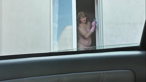 Nude woman neighbor sexy mature Milf without panties and bra washes windows her apartment. A taxi driver watches from car. Solo. Naked in public Peeping Outdoor Outside Publicly Big natural tits Pussy