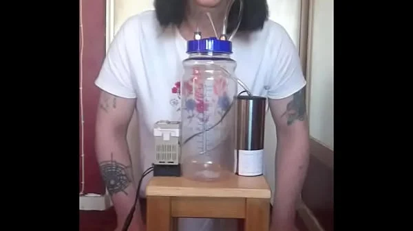 bisexual crossdresser with his portable cow milking machine part 1