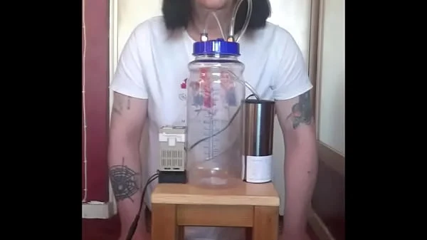 bisexual crossdresser with his portable cow milking machine