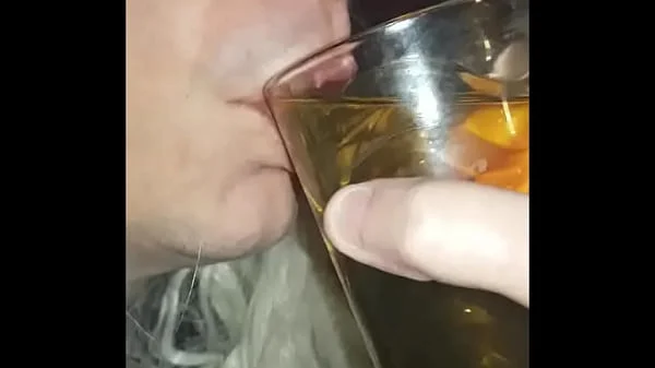 blindfolded bisexual crossdresser fed his own pee by his girlfriend