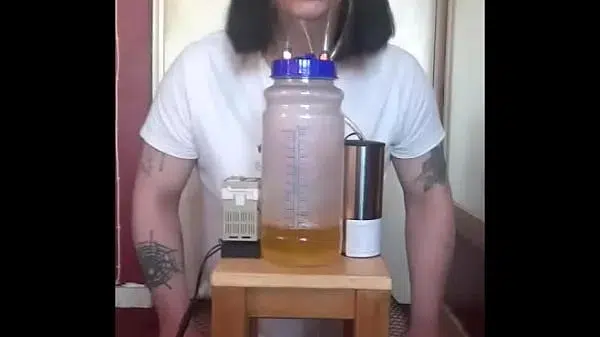 bisexual crossdresser with his portable cow milking machine part 3