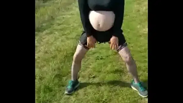 bisexual crossdresser out in public plays with his cock and shoots a load