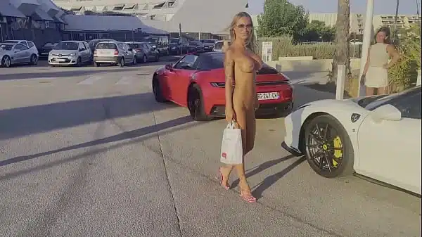 Nude Monika Fox walks around city of France in public